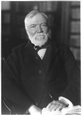 Portrait of Andrew Carnegie seated.