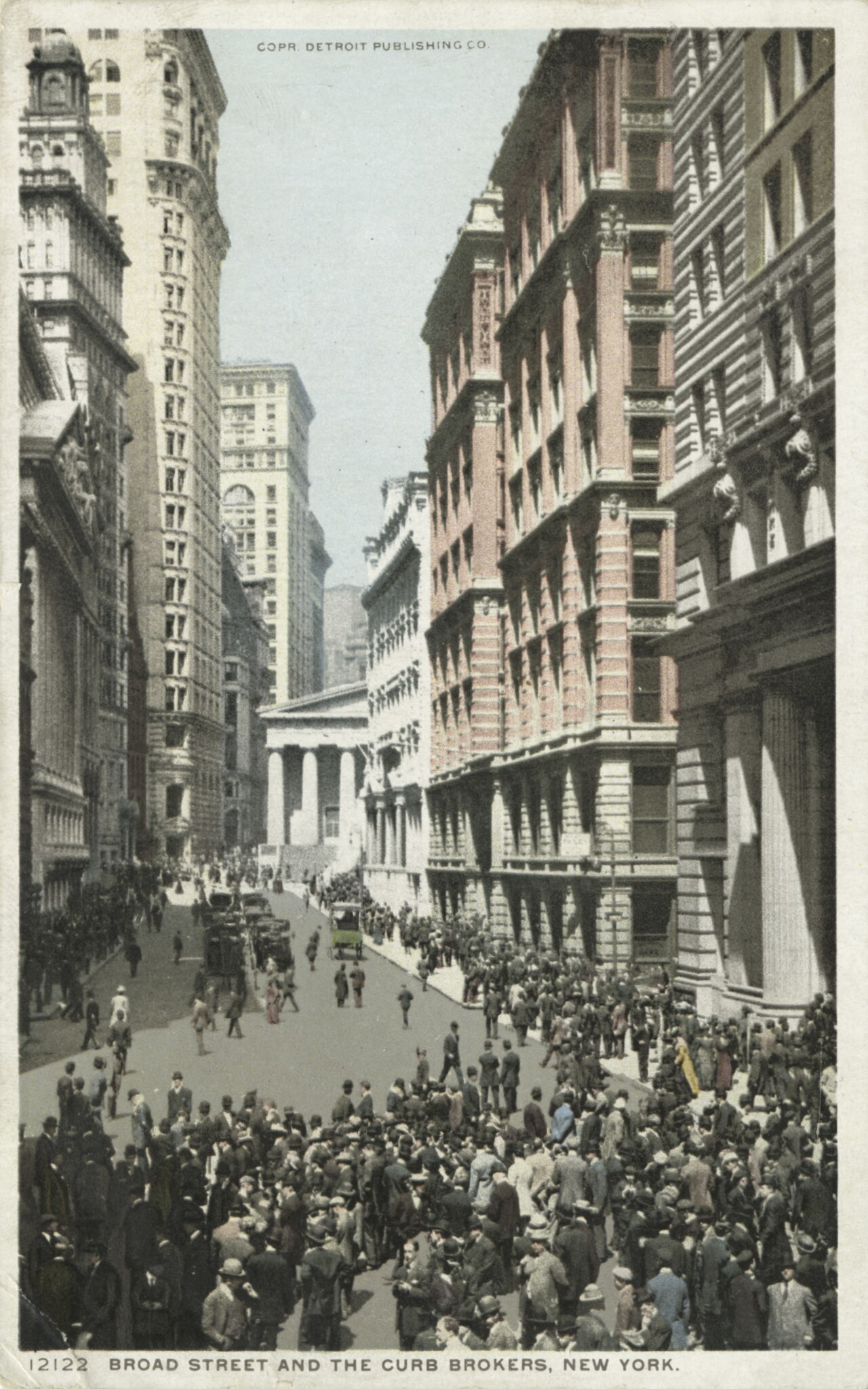 Broad Street around 1900, crowded with curb brokers, with the New York Stock Exchange building visible at the end of the street