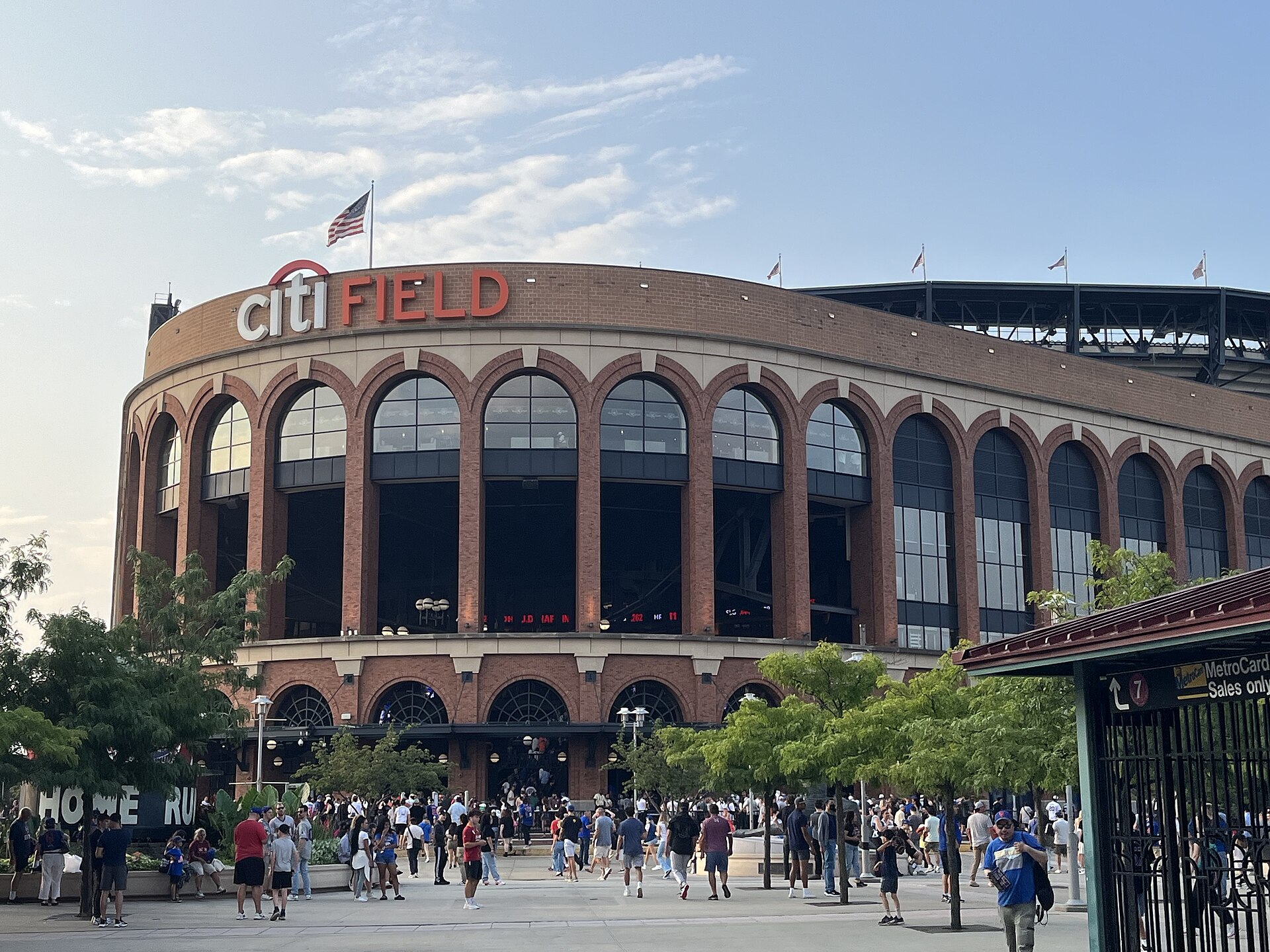 Citi Field's main entrance and brick facade behind the Jackie Robinson Rotunda, photographed in 2024
