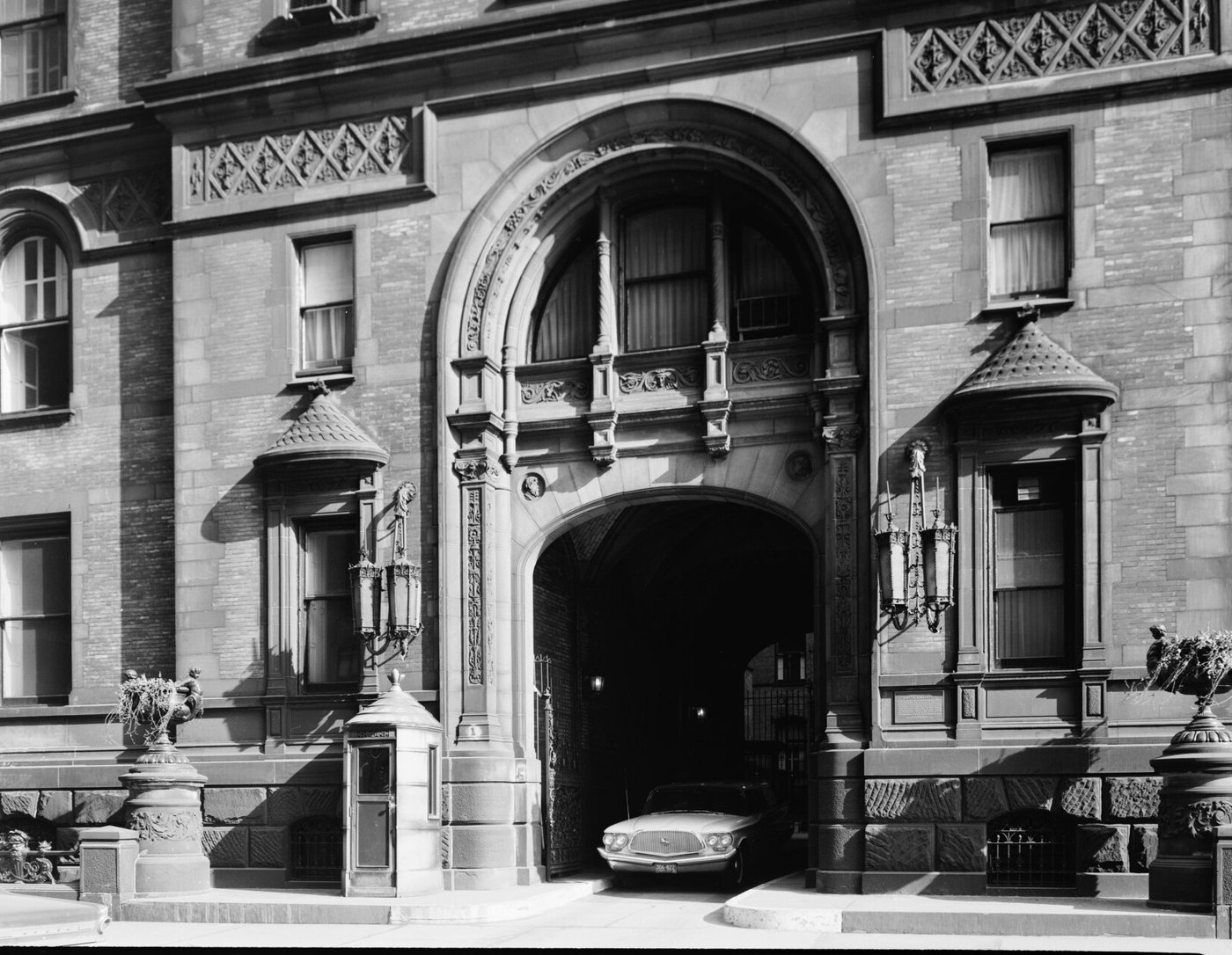 The Dakota's arched 72nd Street entrance with its sentry box.