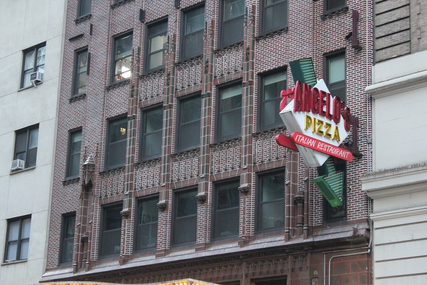 The upper brick facade of the building housing the Ed Sullivan Theater on Broadway in Manhattan, November 2021
