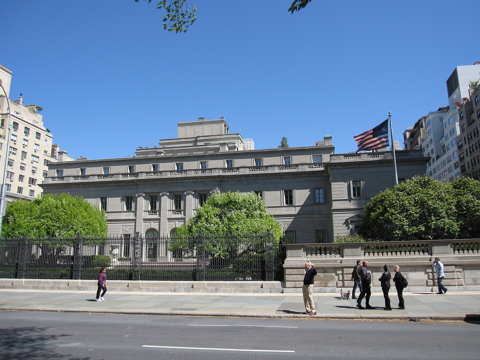 The East 70th Street side of the Frick Collection mansion, with its low wings and limestone walls