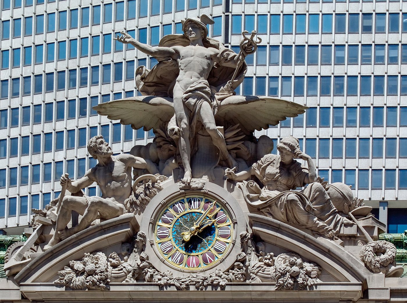 The sculpture group of Mercury, Hercules and Minerva above the clock on Grand Central Terminal.