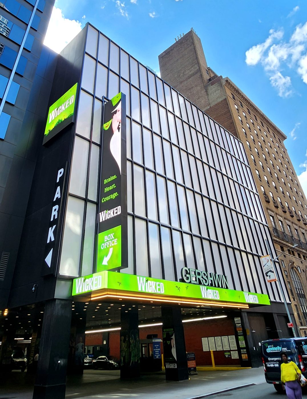 The Gershwin Theatre glass facade with Wicked banners on West 51st Street in Manhattan, 2022