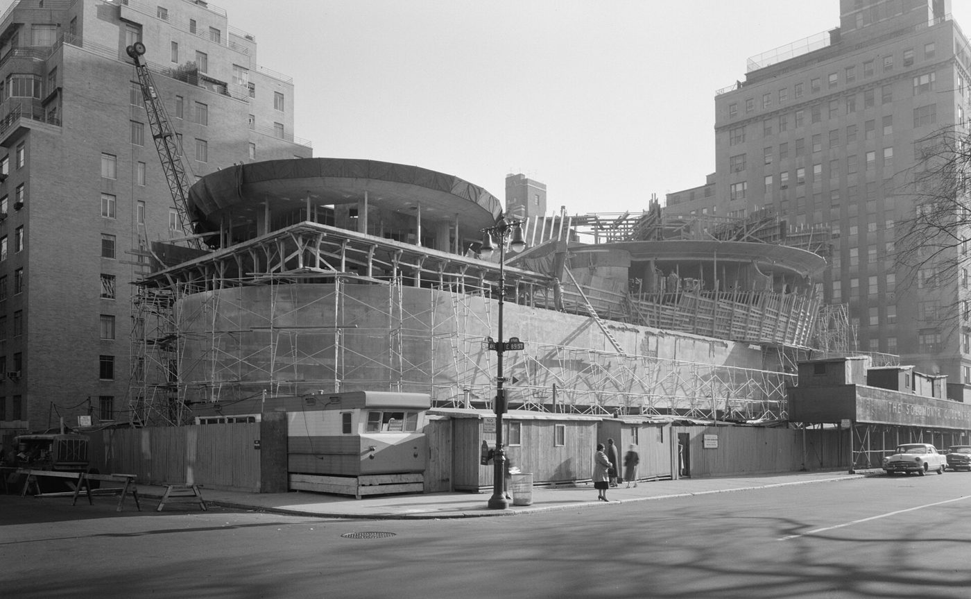 The Guggenheim Museum under construction at 88th Street and Fifth Avenue, with scaffolding around the rotunda