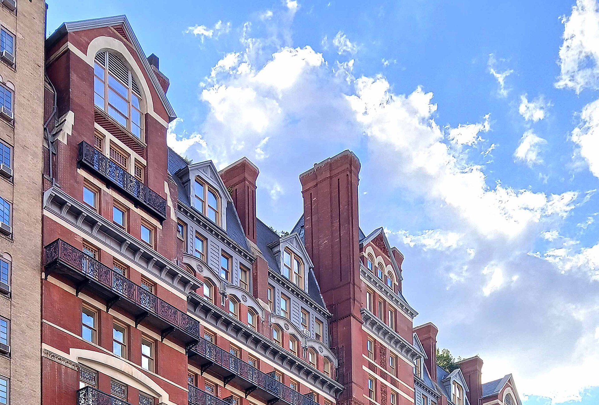The red-brick facade and iron balconies of the Hotel Chelsea on West 23rd Street
