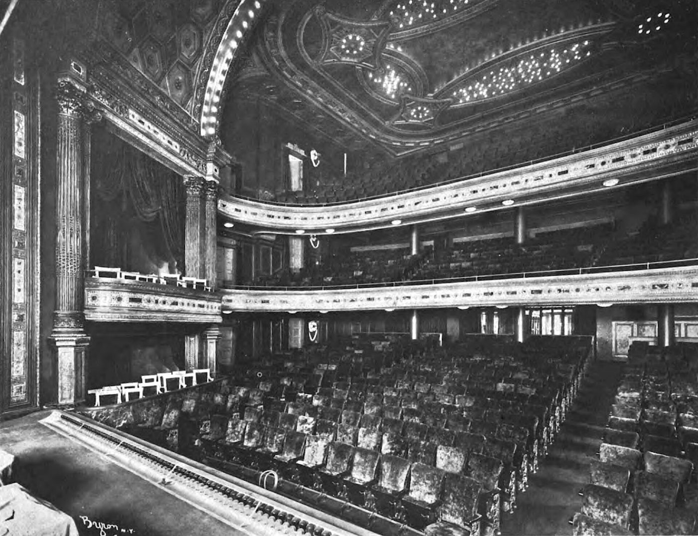 The auditorium of the Hudson Theatre in Manhattan seen from the stage with its balconies and ornate ceiling, early twentieth century