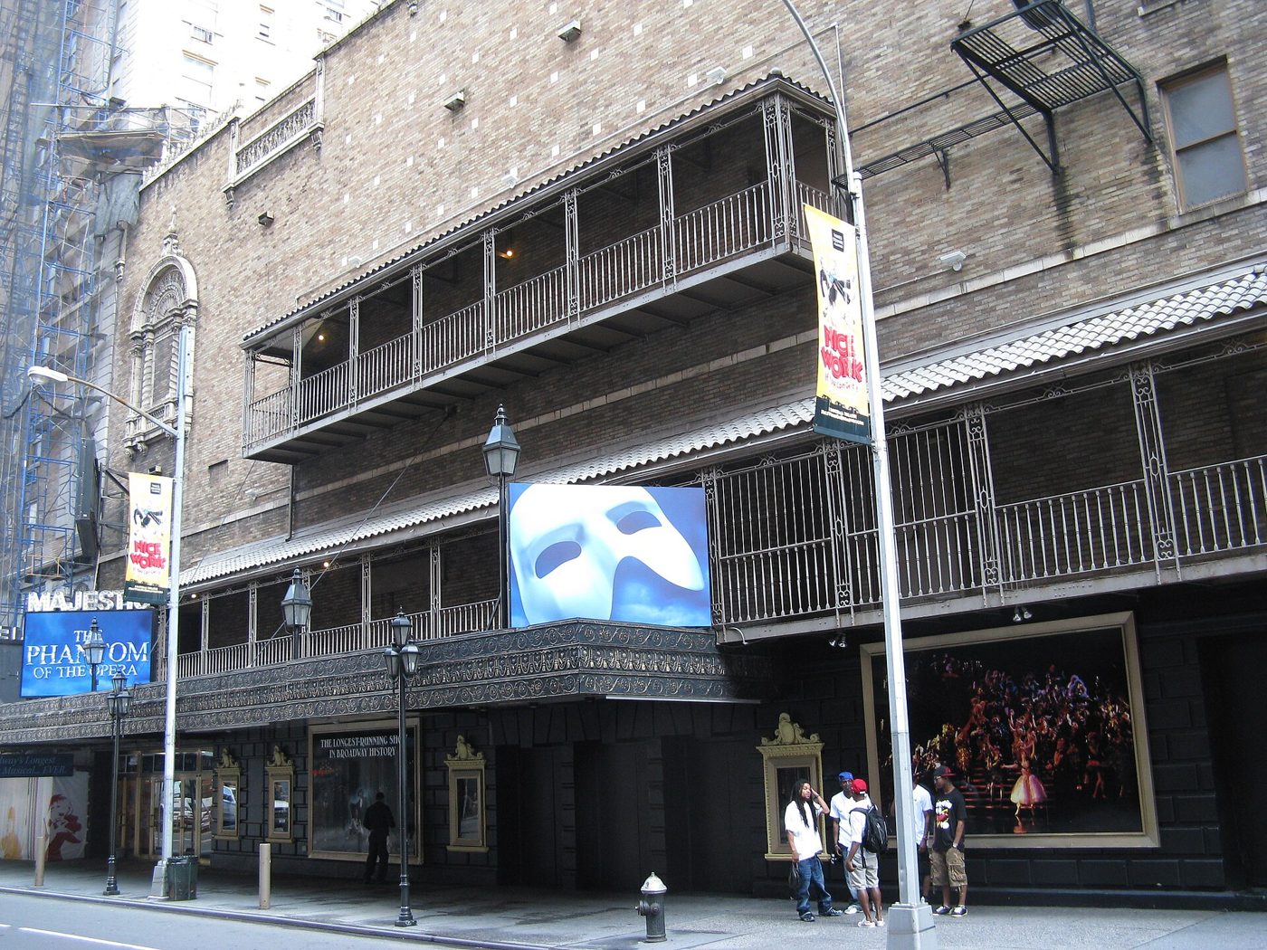 The brick facade of the Majestic Theatre on West 44th Street in Manhattan with a Phantom of the Opera banner, 2012