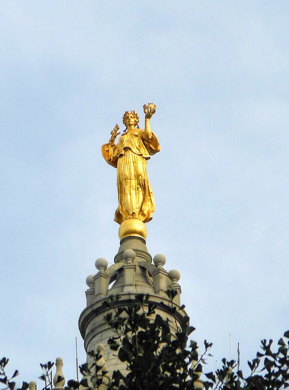 The gilded Civic Fame figure above the Municipal Building - Manhattan Municipal Building, New York City