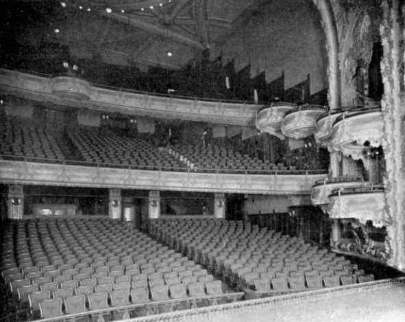 The auditorium of the New Amsterdam Theatre from the stage, showing rows of seats and the balcony, about 1906