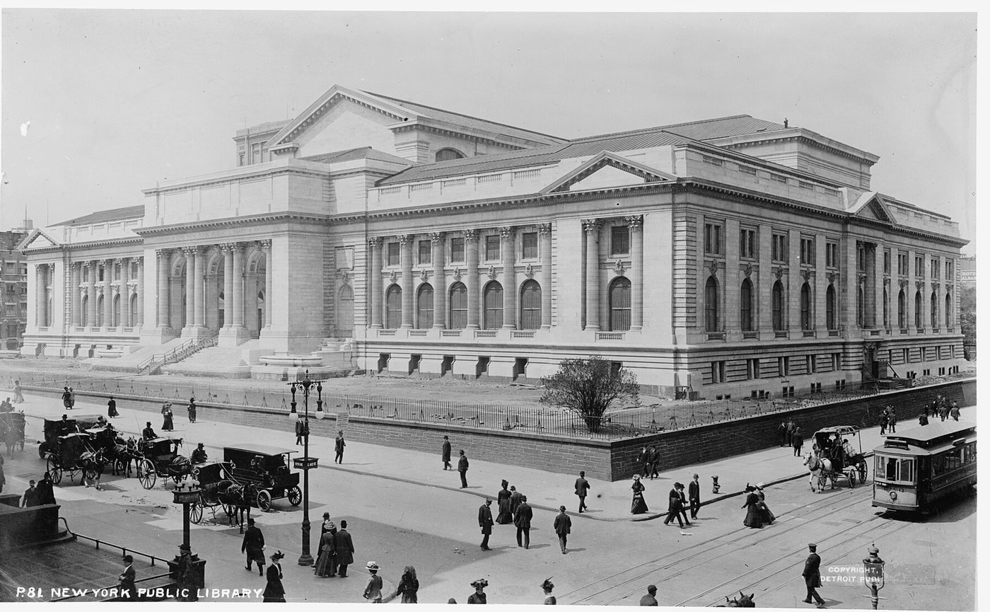 The New York Public Library nearing completion on Fifth Avenue in 1908, with carriages and a trolley on the street.