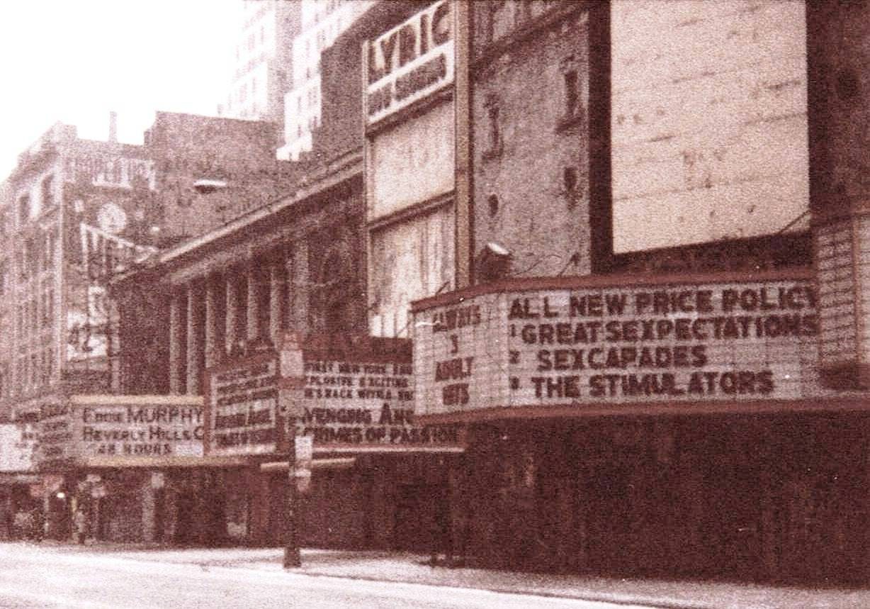 The old Lyric Theatre marquee on 42nd Street in Manhattan in 1985, before renovation, showing a faded movie-house sign