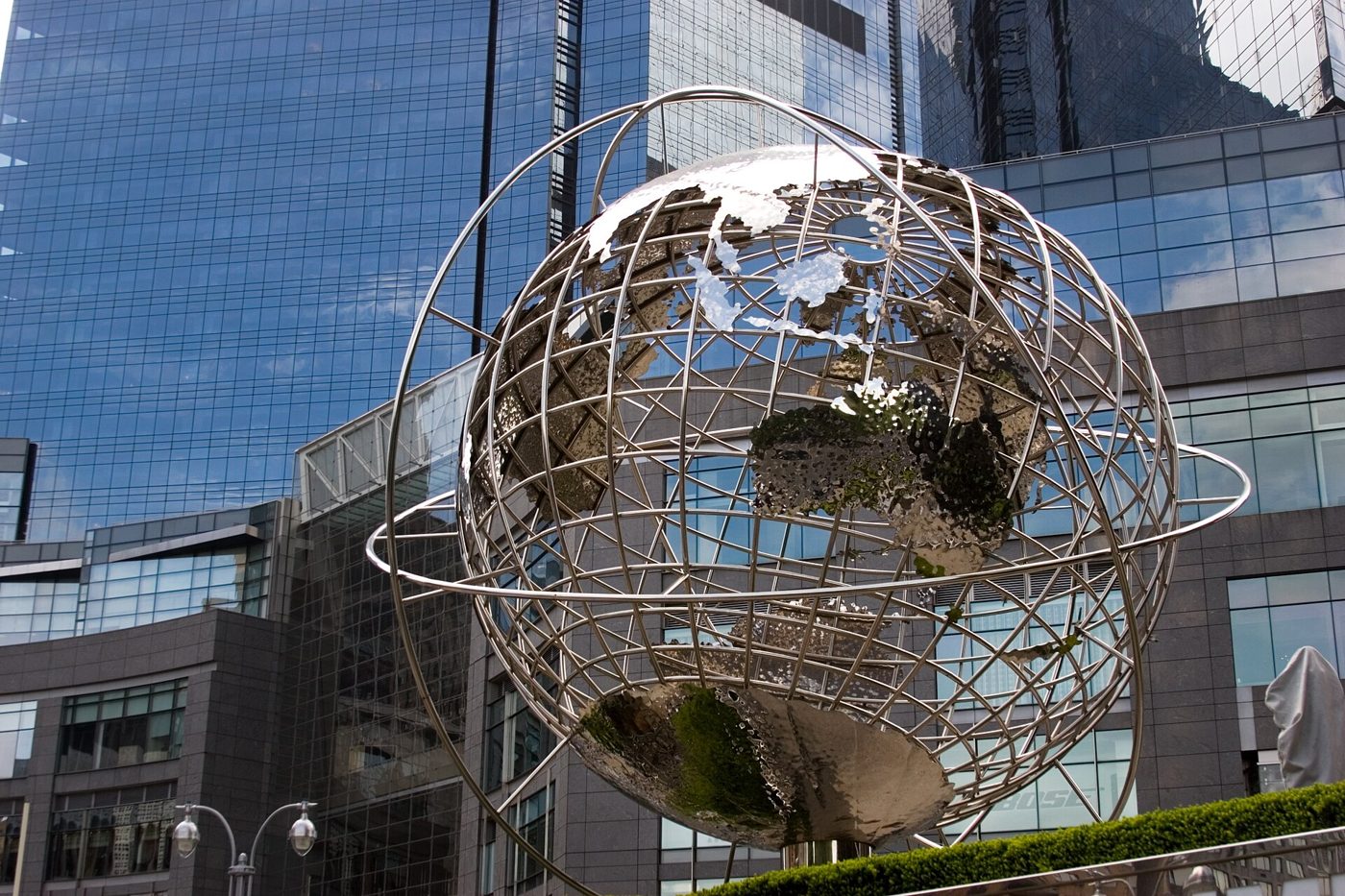 Stainless-steel globe sculpture with continents visible on the plaza in front of Trump International Hotel and Tower at Columbus Circle