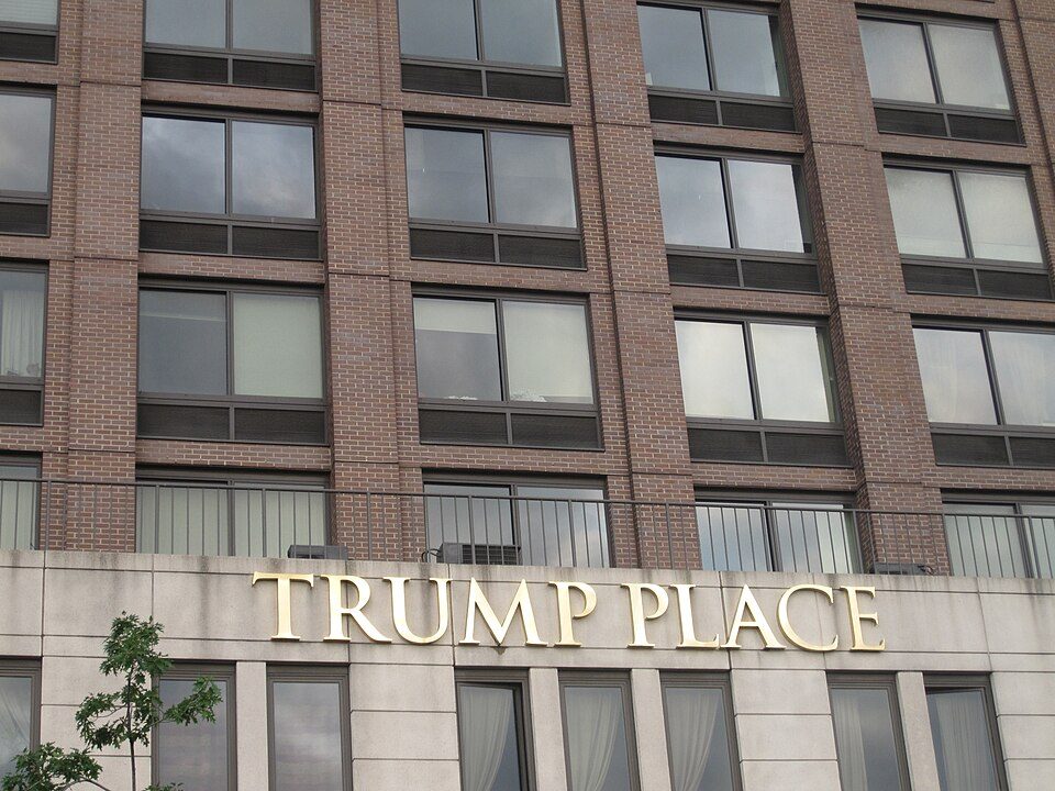 Gold Trump Place lettering above the entrance of a Riverside Boulevard apartment building on the Upper West Side of Manhattan