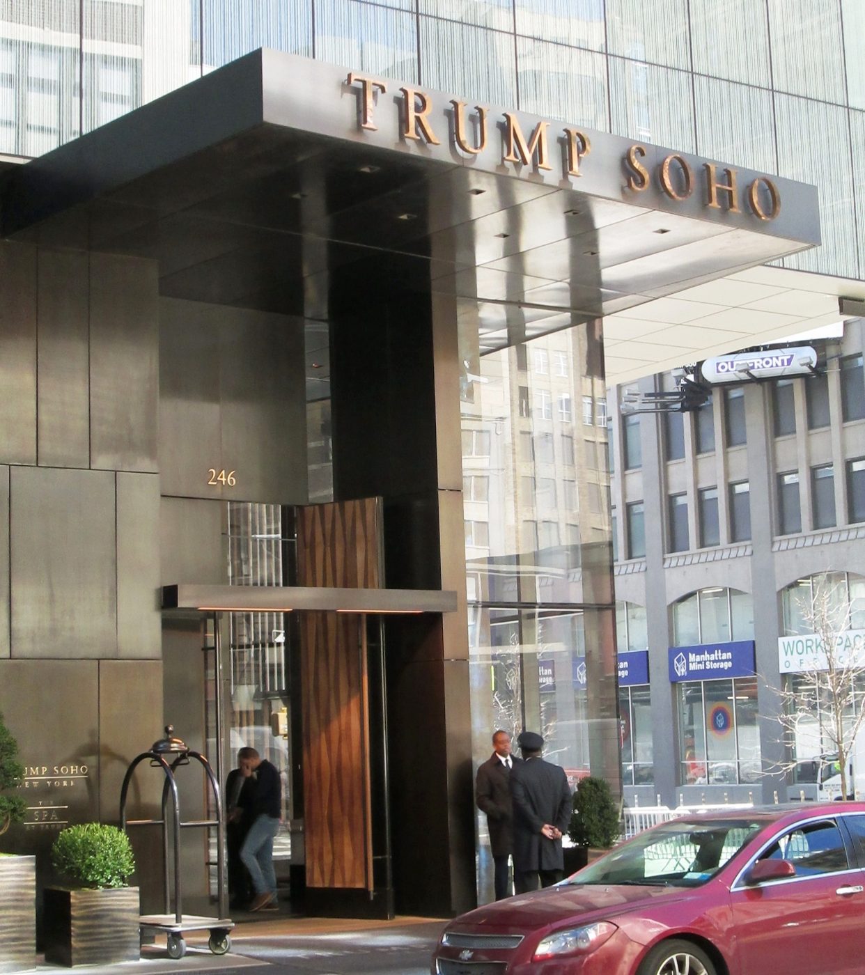 Entrance canopy of Trump SoHo on Spring Street in Manhattan with the Trump SoHo name