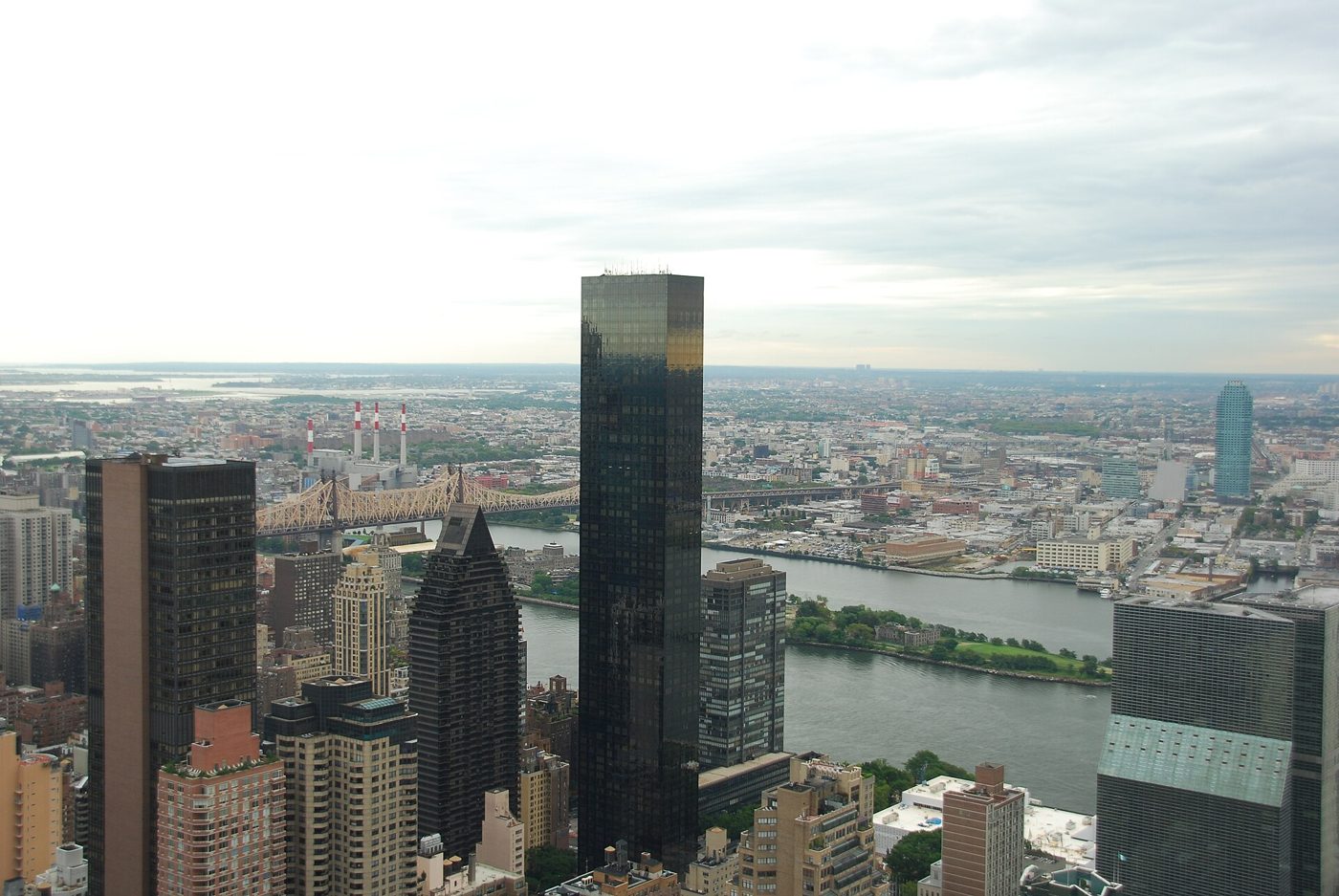 Trump World Tower rising among the buildings of Turtle Bay with the East River and Queens beyond