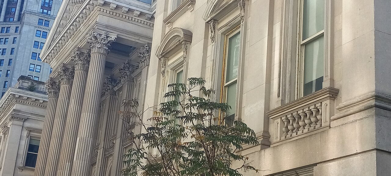 The Tweed Courthouse behind City Hall Park, its marble facade gleaming after restoration.