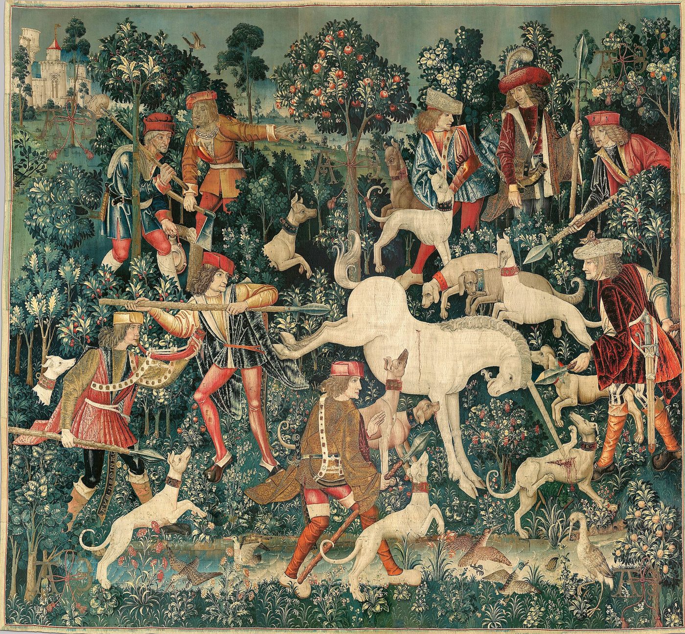 Medieval tapestry showing hunters and hounds surrounding a white unicorn in a field of flowers