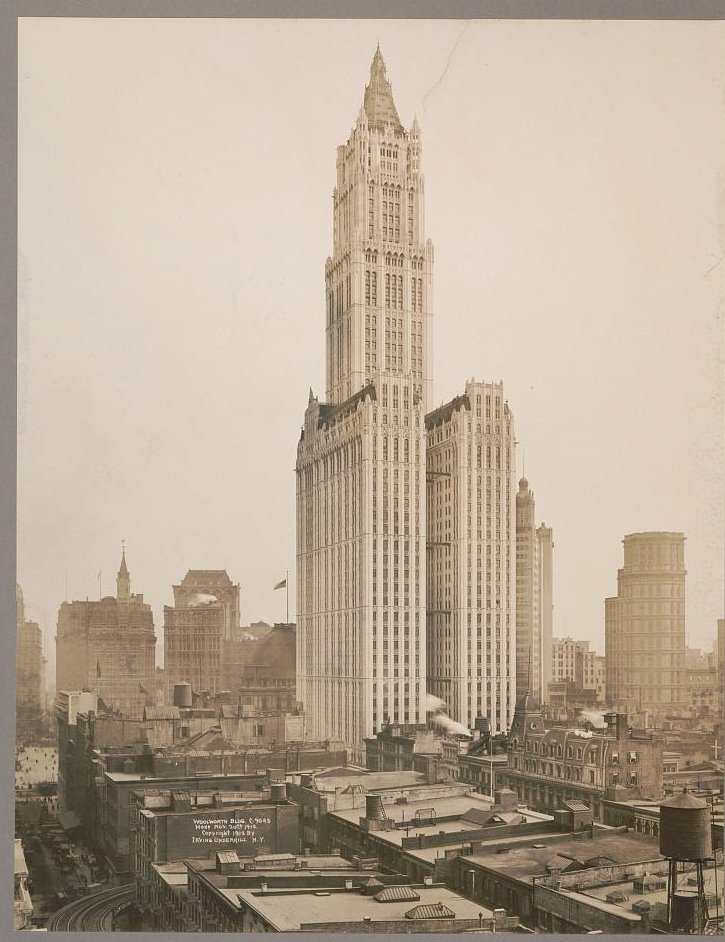 The Woolworth Building rising above Lower Manhattan around 1912.