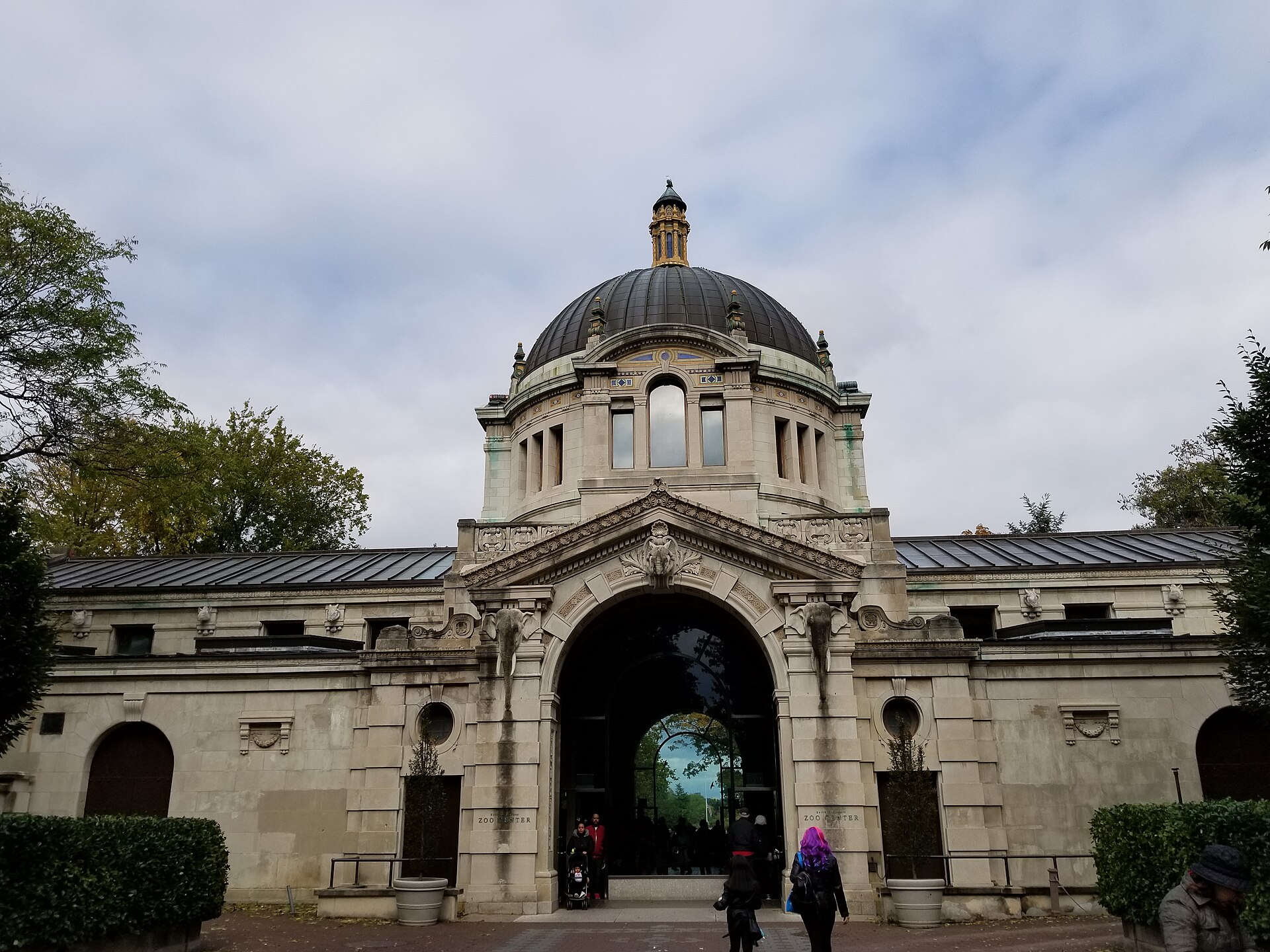 The Zoo Center building at the Bronx Zoo, a domed Beaux-Arts structure with carved elephant heads flanking a tall arched entrance
